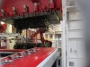 The flat aluminum panels are pressed into shape. Robots do all the heavy lifting.