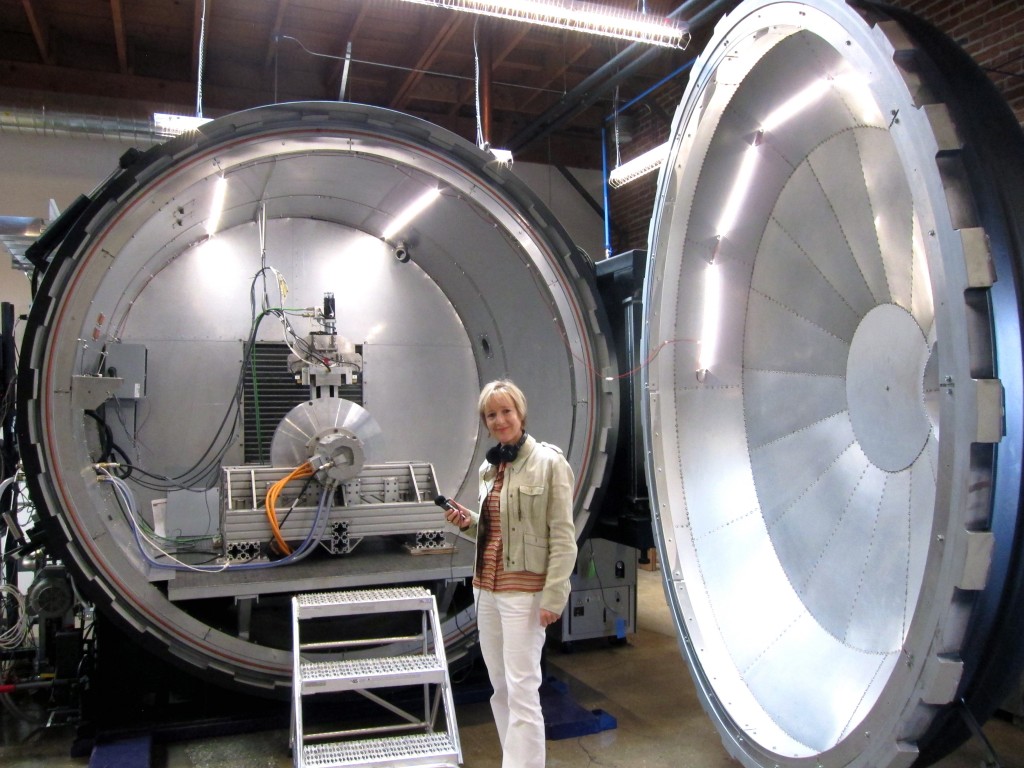 Alison van Diggelen records Hyperloop Tech's levitation test rig