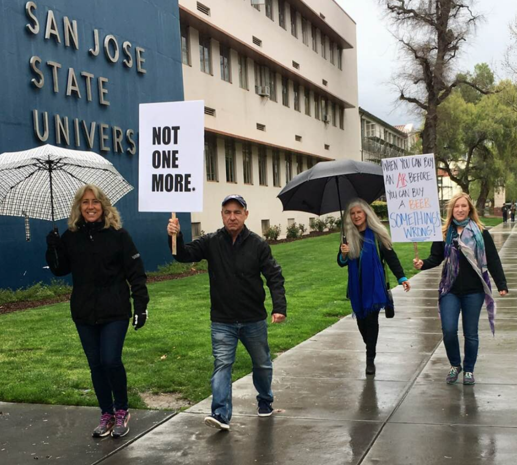 Pam, Chris, MacKenzie Mossing, Shannon McElyea marching vs guns 2018