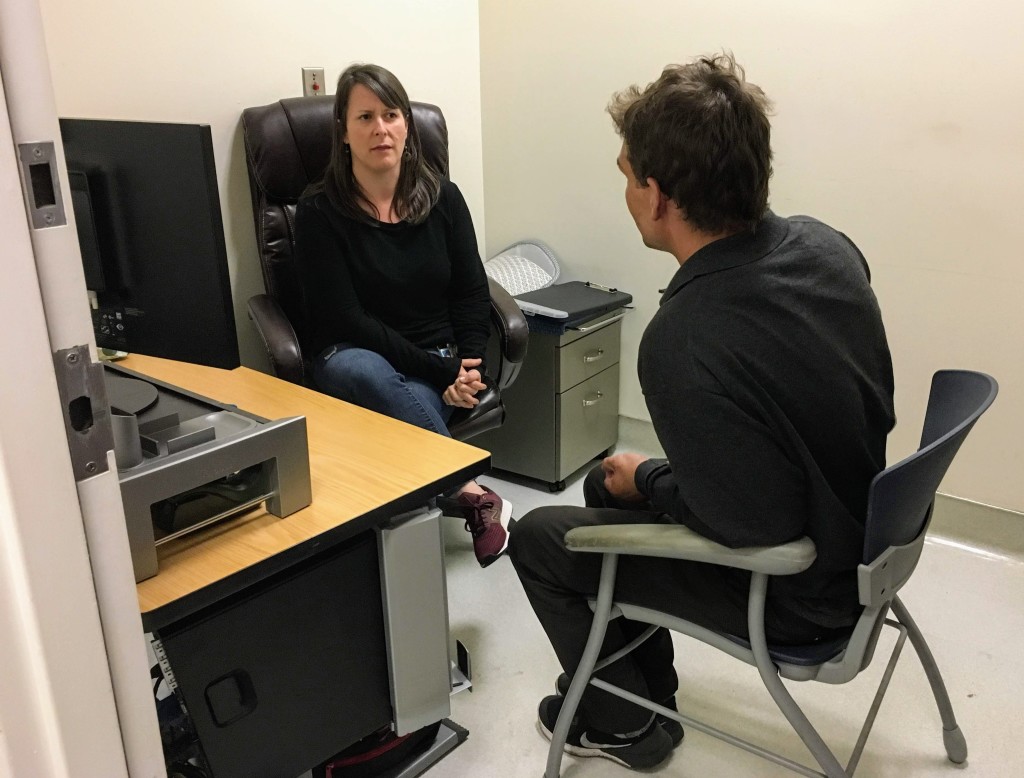 Nurse Sarah Strieff talks with patient, SF homeless Street Team, Photo by Alison van Diggelen